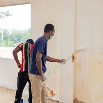 Mission volunteers cleaning a community space