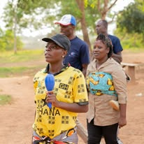 Mission participants walking together through the community