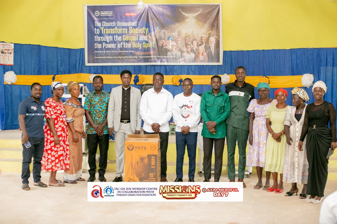 Axim mission team and community members gathered at a mission event